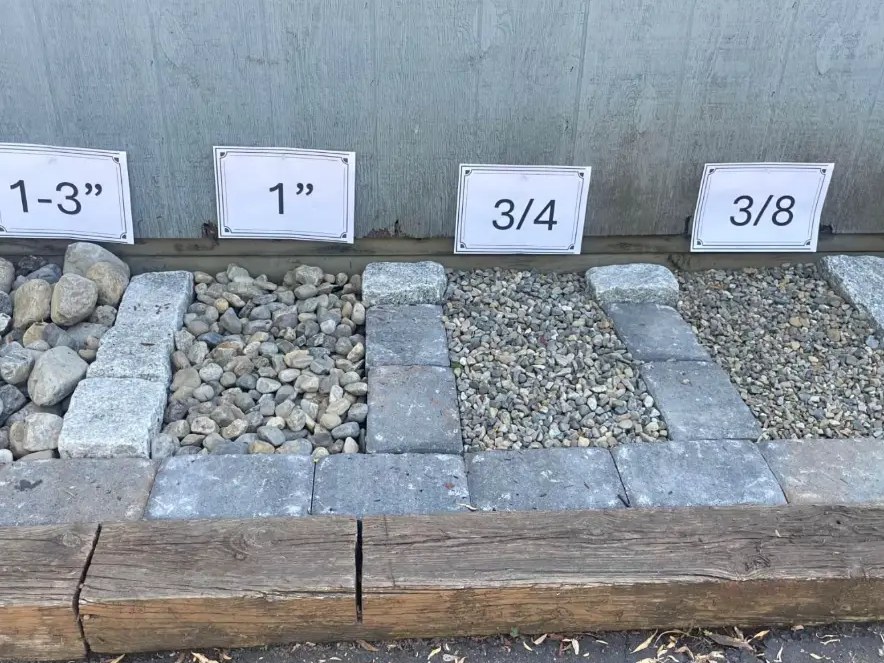 River rock displayed in 1-3 inch, 1 inch, 3/4 inch and 3/8 inch sizes
